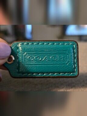 Coach Dark Teal Textured Patent Leather Rectangle Logo Tag